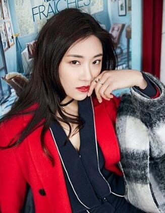 “国民妹妹”菅纫姿晒美照，阳光沙滩美如少女